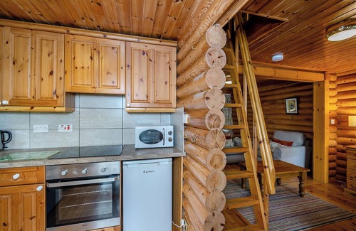 Westleigh Ski Chalet | Timber lodge set in an elevated position with views of the lake.
