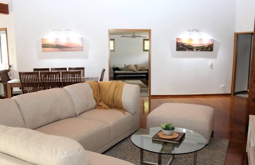 Boomerang Beach House | Timeless house with heated spa pool, walk to beaches.