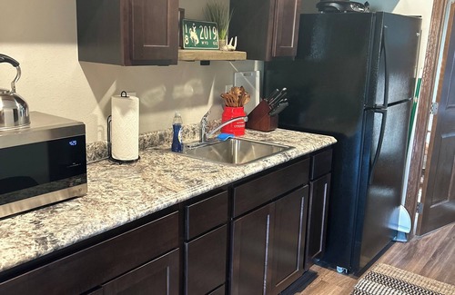 Hulett Cabin | Tiny Home Cabin with Wyoming Modern Frontier style in the town of Hulett