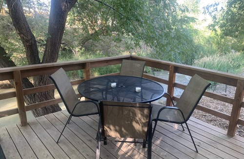 Montrose House | Tiny home located beside a creek.