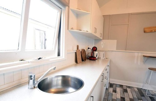 Strahan Cottage | Tiny house perfect couples retreat on the shore of Lettes Bay