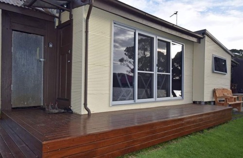 Strahan Cottage | Tiny house perfect couples retreat on the shore of Lettes Bay