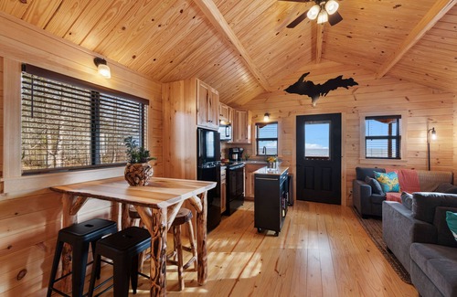 Escanaba Cabin | Tiny Log Cabin on Lake Michigan Shore Full Week Rental