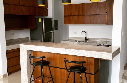 Tizimin House | Tizimín retreat: stylish townhouses, natural harmony, modern comforts.