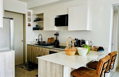 San Jose Condo | Top floor 2-bedroom condo in San José with AC, WiFi 300 mb & Parking