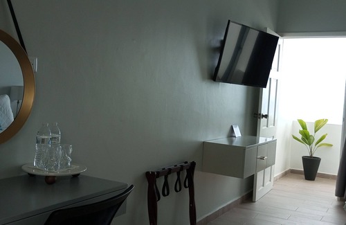 Sector 2 Hotel | Top floor stylish Queen room, balcony with great Caribbean view. Parking,Netflix