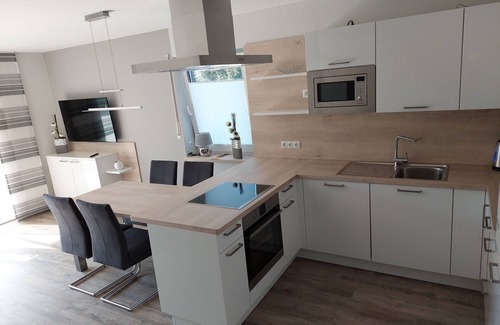 Geeste Apartment | TOP! New build - High-quality and modern DHH, wallbox, electric fireplace, WLAN, close to the lake