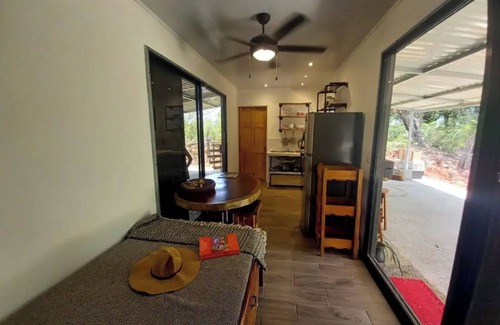 Puerto Carrillo House | Tranquil retreat on coastal route. By sand, surf, river, & jungle. Perfect vibe.