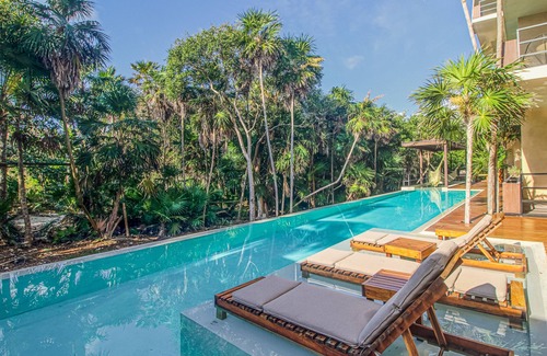 Tulsayab Apartment | Tranquil getaway by the beach with amazing pool & lush grounds