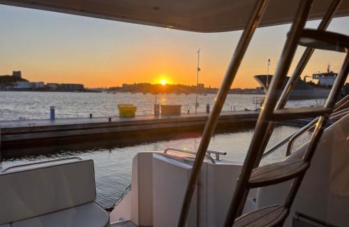 Turnchapel Boat Rental | Tranquility Yachts -a 52ft Motor Yacht with waterfront views over Plymouth.