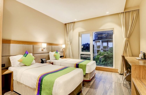 Block E Hotel | Treebo Radhe Palace