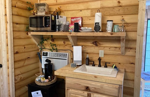 Nixa Cabin | Treehouse cabin-unique stay-convenient location yet very secluded atmosphere