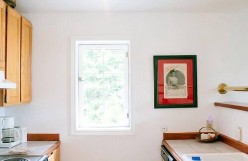 Olga Apartment | Treetop Pastoral Views, Beach Access, Beautiful Light in Converted Barn Apt.