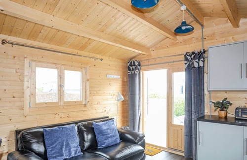 Rhosneigr Cabin | TREM Y MOR LODGE, pet friendly, country holiday cottage in Rhosneigr