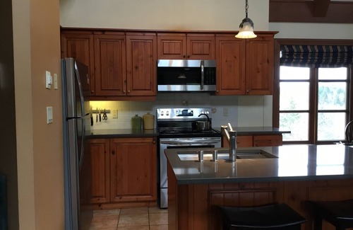 Mont-Tremblant Condo | Tremblant, on resort, ski in & out, 4 bedroom, sleeps 8, skating rink + fire pit
