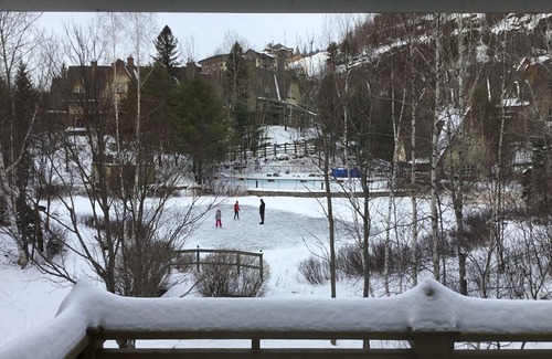 Mont-Tremblant Condo | Tremblant, on resort, ski in & out, 4 bedroom, sleeps 8, skating rink + fire pit