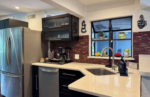 Clearwater House | Tropical Lagoon w/Private Pool & Game Room!