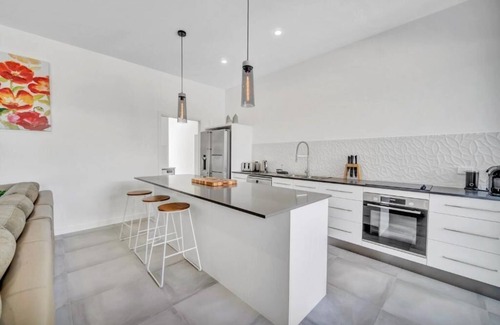 Port Douglas House | Tropical Private Oasis with heated pool just a short walk away from 4 mile beach