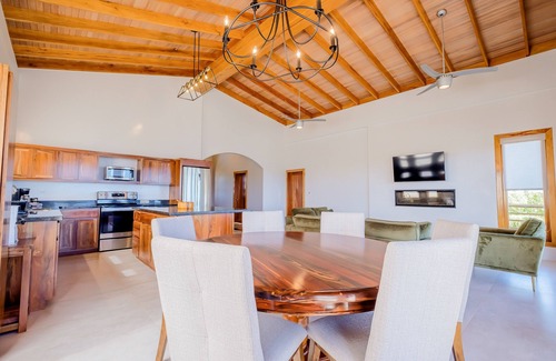 Caye Caulker Villa | Tropical retreat with a pool, dock, bikes, canoes, balconies, and 360 views