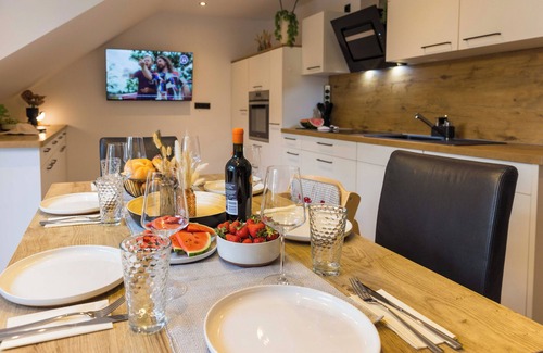 Hof Apartment | Tropical whisper penthouse in Hof. Balcony, Weber grill, whirlpool, digital check-in