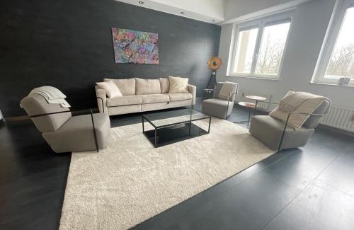 Langenhorn Apartment | TruRetreats Design Loft für 8 Personen I Riesige Küche I eCharger I 65z SmartTV I 150qm