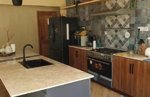 Moshi Apartment | Tulivu Escape: Friends/Family Room