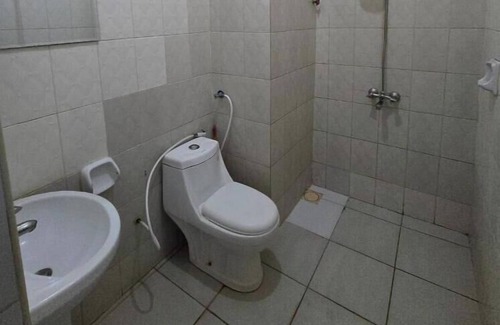 Moshi Apartment | Tulivu Urban: Relaxing room at the centre