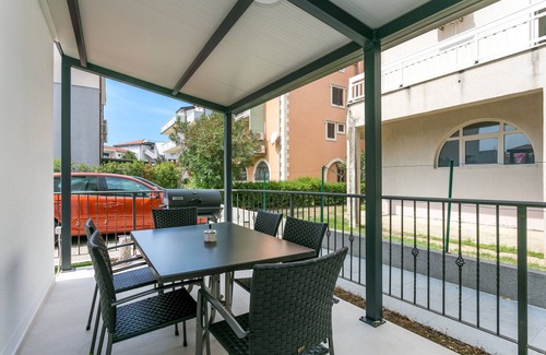 Strozanac Apartment | Two bedroom apartment with terrace Podstrana, Split (A-22897-a)