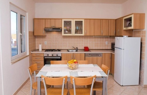 Postira Apartment | Two bedroom apartment with terrace and sea view Postira, Brač (A-17323-a)