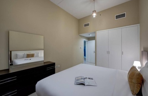 Dubai Investment Park Hotel | Two Bedroom Apartment Near Dunes Village Dip By Luxury Bookings