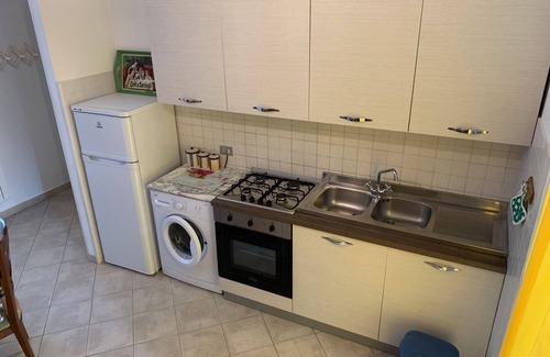 Ronchi Apartment | Two bedroom apartment with verandah, 100m from the beach. Free WiFi.