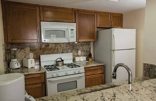 Noord Hotel | Two Bedroom Suite @ Caribbean Palm Village Resort