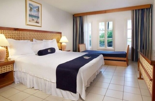 Noord Hotel | Two Bedroom Suite @ Caribbean Palm Village Resort