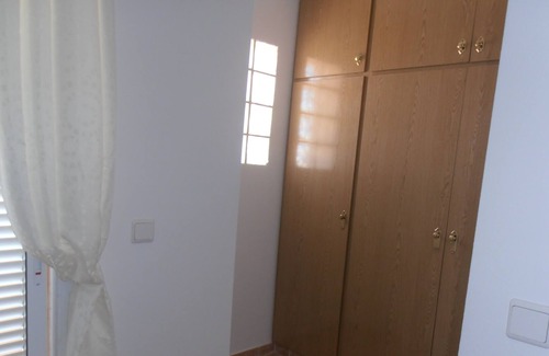 Monte Faro House | Two Bedroom Town House, Communal Swimming Pool, Wi Fi, UK TV and sports court