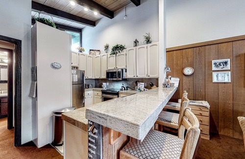 Mammoth Lakes Condo | Two-story condo w/mountain views, balcony, gas grill, & wood-burning fireplace