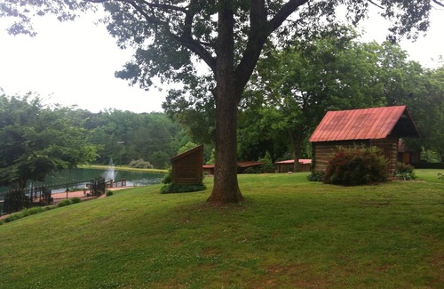 Pittsboro House | Two story cottage on 62 acre Het Landhuis estate