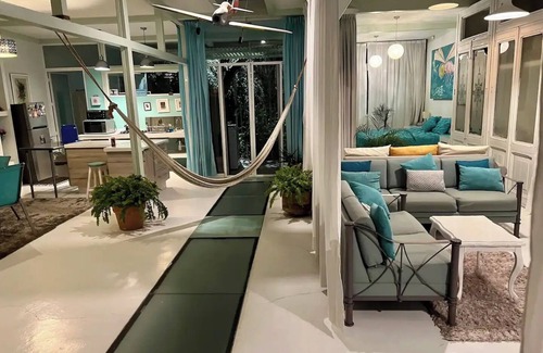 Oaxaca House | Two story high ceiling loft with heated pool