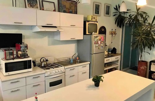 Oaxaca House | Two story high ceiling loft with heated pool