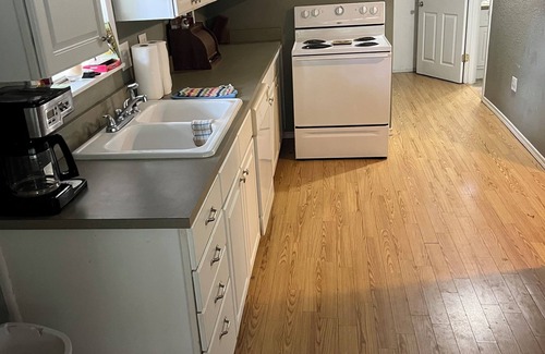 Jefferson House | Two Story House with deck over the river