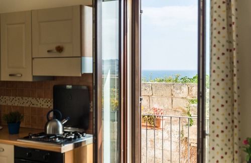 Centro Storico Apartment | Typical house with terrazzo overhanging seen sea
