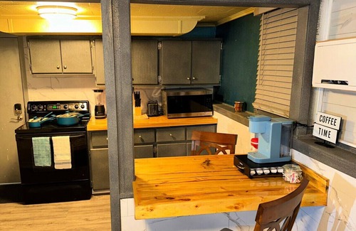 Moorhead Apartment | Unique Discreet Hidden Entrance. Sleep in with 2pm checkout!