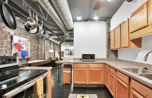 Midtown Apartment | UNIQUE granite wall GAME CAVE dynamite location #22