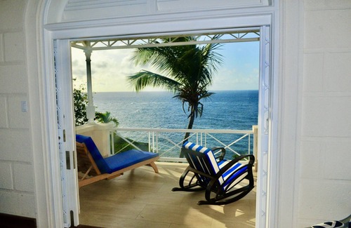 Trents Villa | Unique, Secluded Corral Stone Villa with large gardens and private beach access