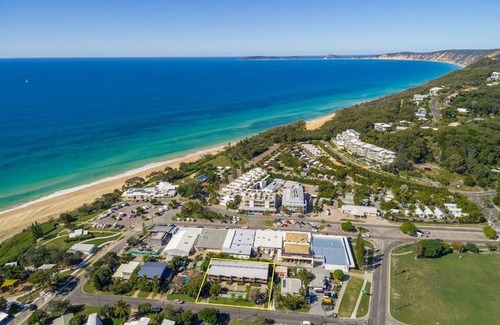 Rainbow Beach Villa | Unit 5 Rainbow Surf - Modern double storey townhouse with large shared pool close to beach and shop