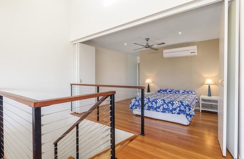Rainbow Beach Villa | Unit 5 Rainbow Surf - Modern double storey townhouse with large shared pool close to beach and shop