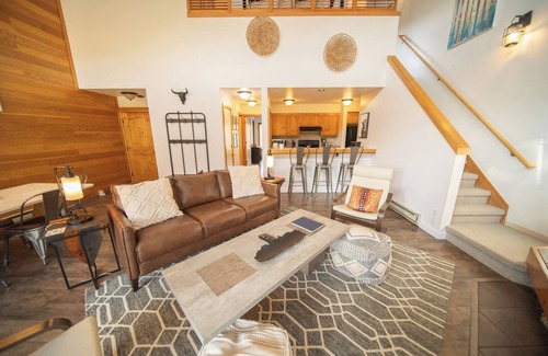 Lakeside Village Condo | Unit with wood burning fireplace and free shuttle