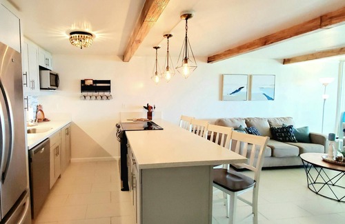 Punaluu Condo | Updated Oceanfront Condo! Long clean beaches to walk & swim! Escape the Crowds!