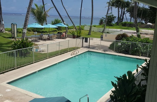 Punaluu Condo | Updated Oceanfront Condo! Long clean beaches to walk & swim! Escape the Crowds!