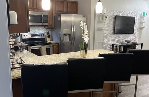 Royal Palm Beach House | Upscale 4BR Oasis- Tranquil Patio, Prime Location