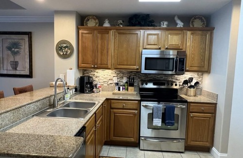 Florida Central Atlantic Coast Condo | Upscale Lakefront Resort Condo at Disney's Doorstep - 1 mi. to Disney Springs!